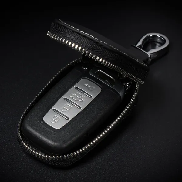 https://d1311wbk6unapo.cloudfront.net/NushopCatalogue/tr:f-webp,w-600,fo-auto/Car_Key_Holder__Car_Key_Cover__Car_Keychain_Case_for_Remote_Key_Fob__Leather_Key_Holder_Cover_Case_with_Car_Key_Wallet_Zipper_in_Gift_Box__BLACK__6CIM5NS3UT_2023-06-18_1.webp__Newhope
