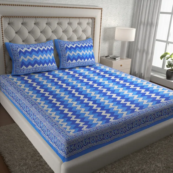 https://d1311wbk6unapo.cloudfront.net/NushopCatalogue/tr:f-webp,w-600,fo-auto/Jaipuri_Traditional_Double_Bed_Bedsheet_with_2_Pillow_Covers_-_Blue__IG3O0HBQUT_2023-12-04_1.jpg__Pink City