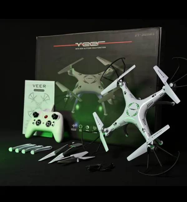 https://d1311wbk6unapo.cloudfront.net/NushopCatalogue/tr:f-webp,w-600,fo-auto/_VEER_360___ALTITUDE_HOLD_DRONE___DOUBLE_BATTERY_DOUBLE_FUN___Drone_With_2.4GHZ_Remote_Control__Green__X98ZN3GLNE_2023-06-28_1.jpg__Believers Emporium